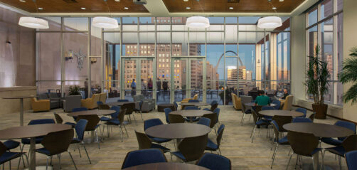 Student lounge and dining area at Saint Louis University School of Law in downtown St. Louis, furnished by Modern Business Interiors with contemporary seating and city skyline views including the Gateway Arch.