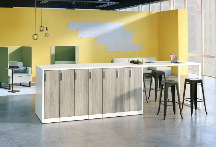 ommercial office storage cabinets with wood finishes beneath colorful suspended acoustic panels