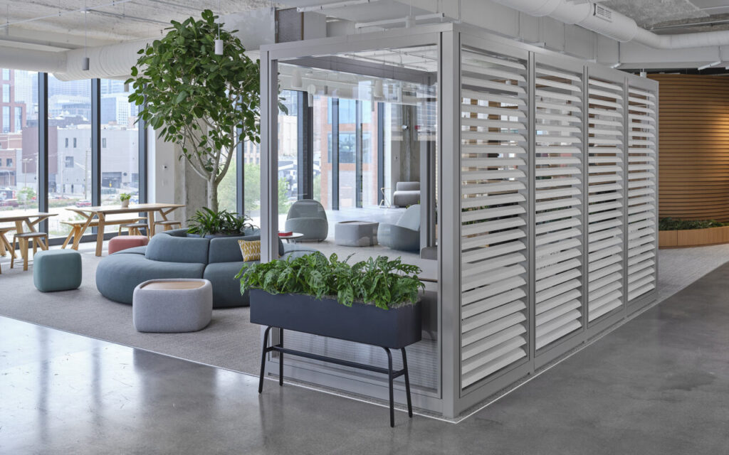 Glass-walled lounge at the Allsteel Fulton Market showroom in Chicago, IL