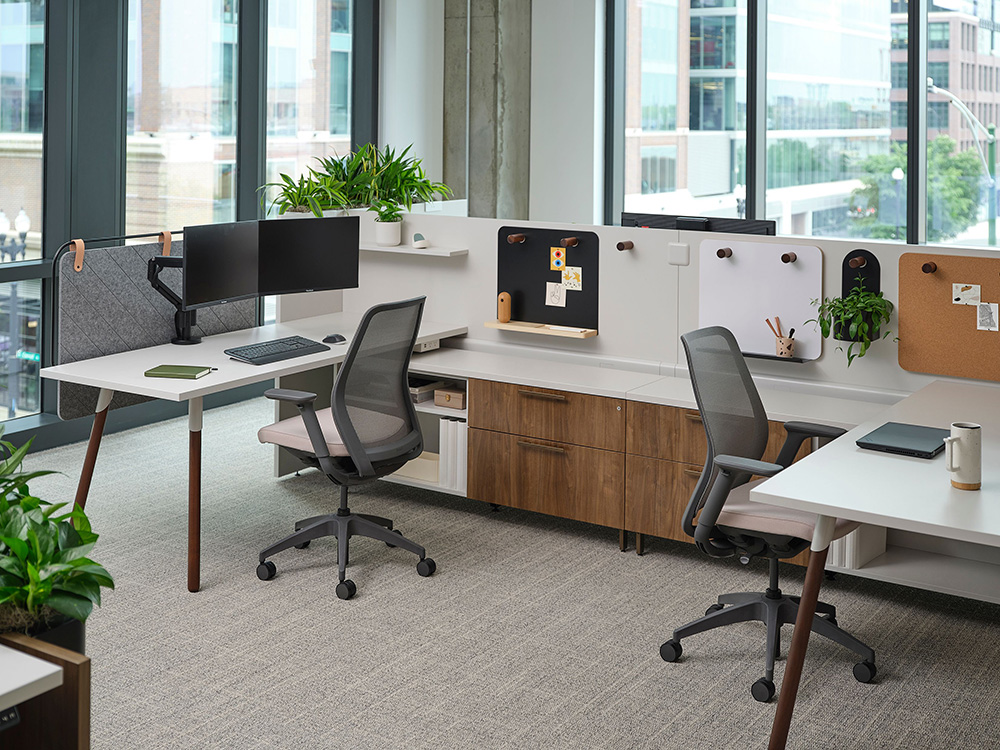 Allsteel Fulton Market showroom workstation with monitors, wood storage, and task chairs in Chicago, IL