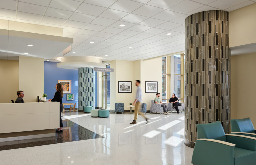 Mercy Hospital Fort Smith lobby with reception desk, waiting chairs, and wood architectural details