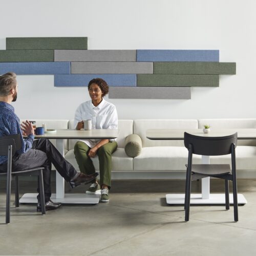 Allsteel Jetty:Mod lounge seating with tables and colorful acoustic wall panels in a modern office