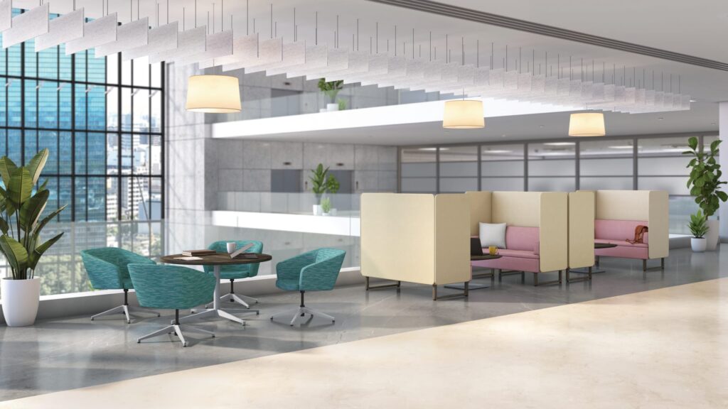 Bright office lounge with collaborative café seating, high-back privacy booths, suspended acoustic ceiling panels, and floor-to-ceiling city views.